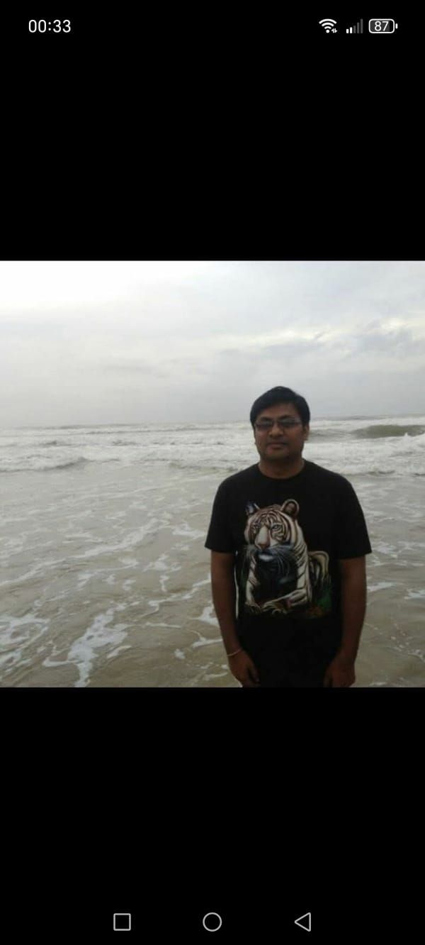 Vishal, founder of Pet Health Notes, at the beach